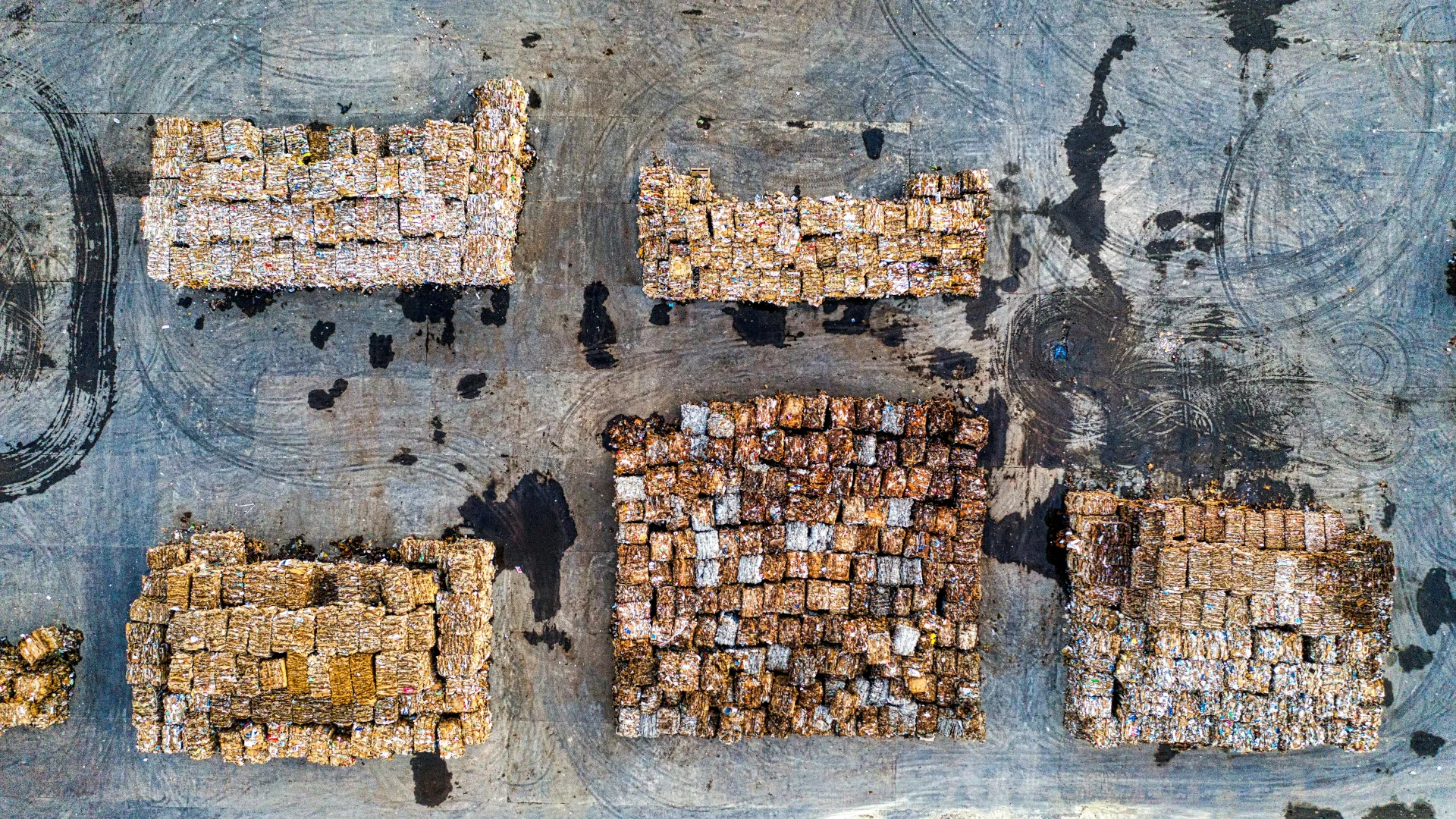 Top down aerial shot of a waste facility, one of the main culprits of odours in the air.